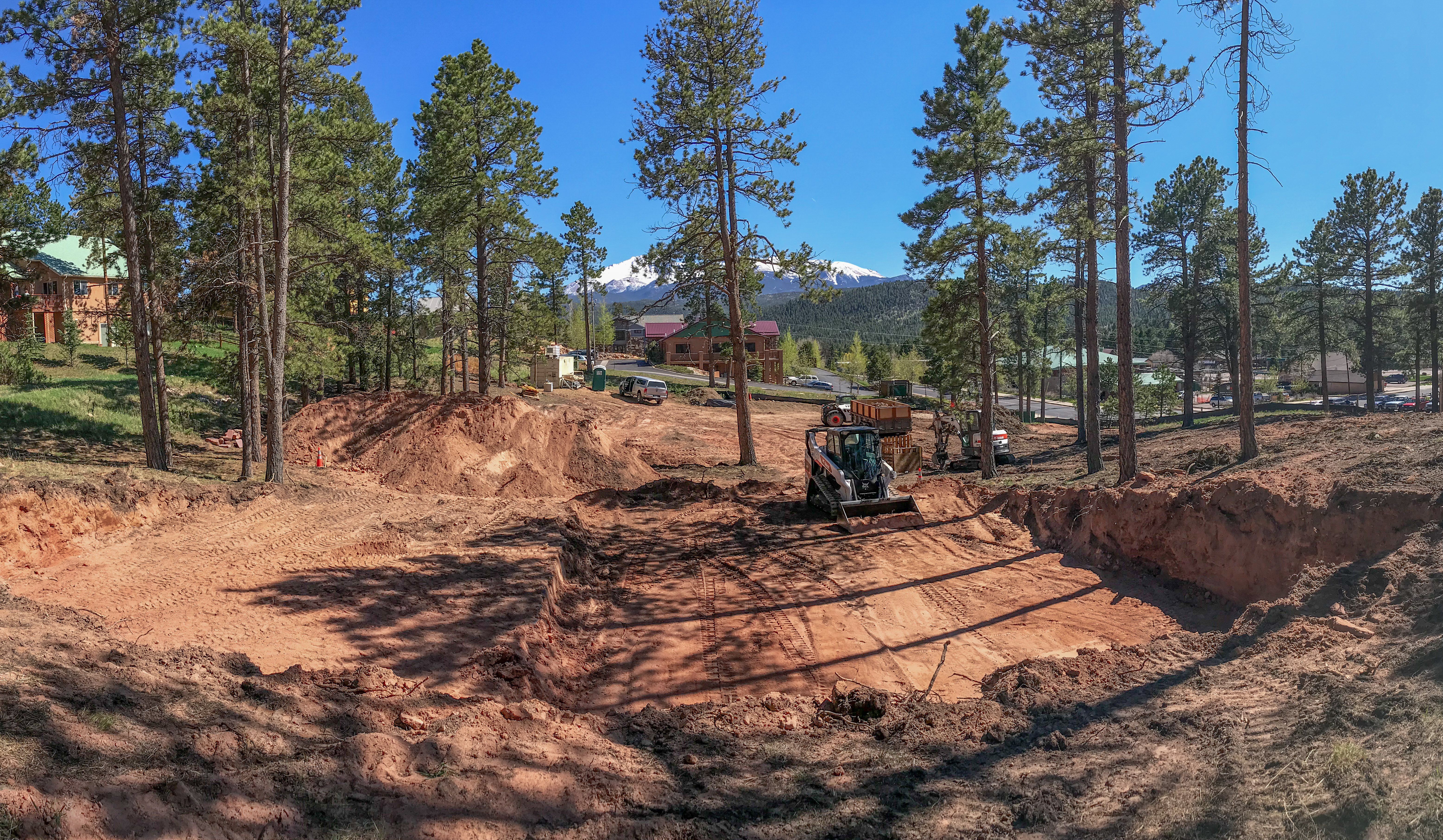 Grading and digging foundations at Rampart Village Townhomes in Woodland Park, CO